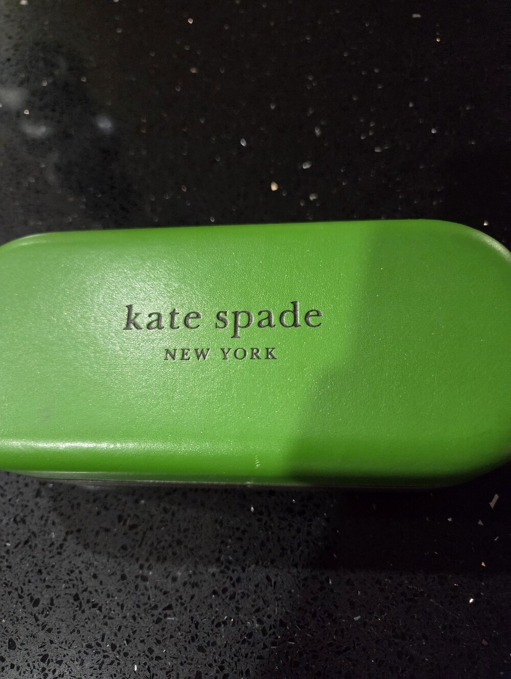 kate spade bright green hard-shell eyewear case.empty
